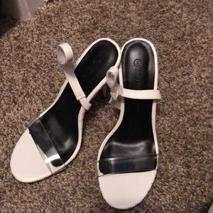 White stilettos clear toe strap